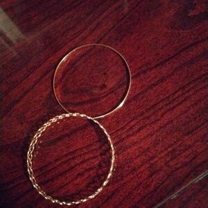 Two gold bracelets